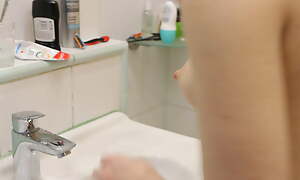 Stepmother unbosom stepson surrounding watch how she cleans her teeth naked and shaves her armpits.