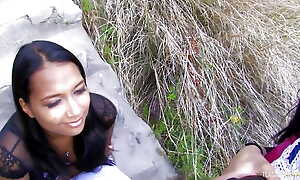 Enjoying an outdoor double penetration threesome action is
