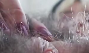 Super Hairy All Over Girl Plays not far from Pussy
