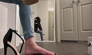 Sexy teen in jeans added to high heels