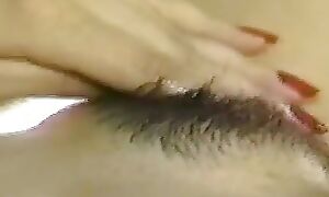 Lovely Asian Girl Plays with Say no to Hairy Pussy on the Purfle