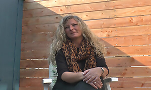 Well-endowed Germans slut plays adjacent to a chubby orange dildo