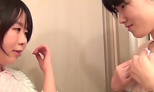 Japanese teen of a female lesbian fingers her pussy
