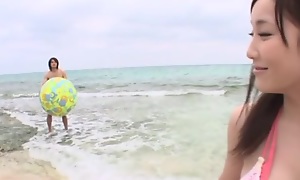 Nice Asian teen enjoys outdoor fucking within reach the beach